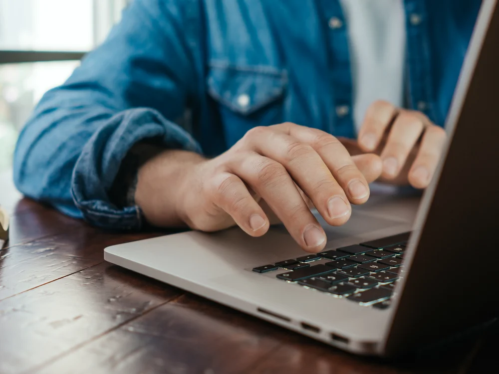 Professional working securely on a laptop