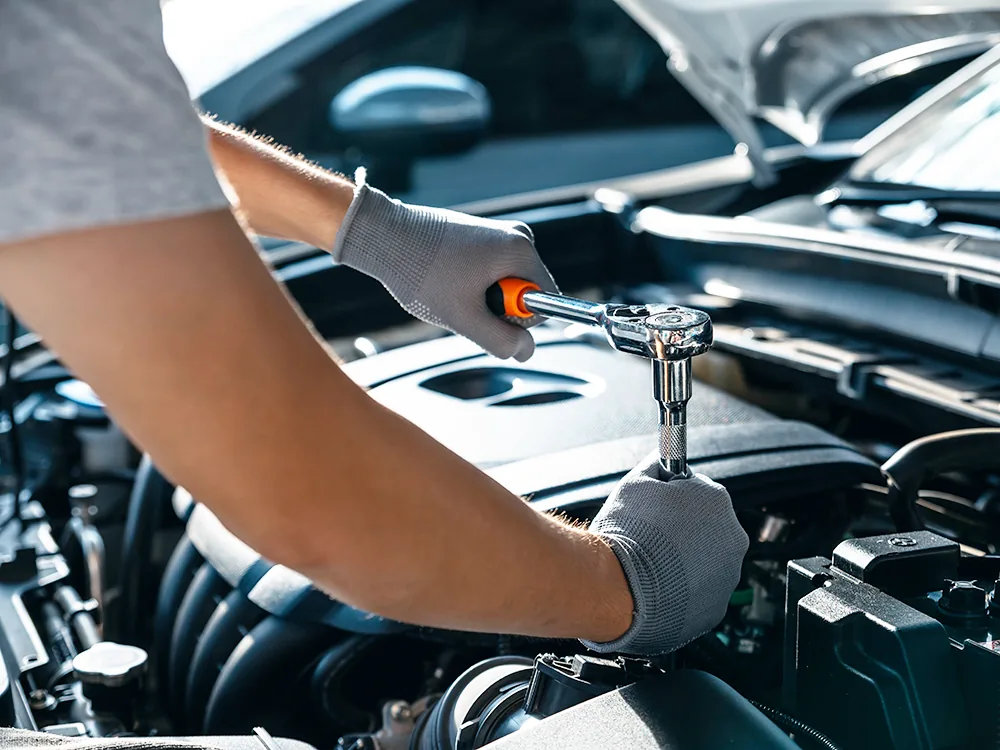 Mechanic working on an engine