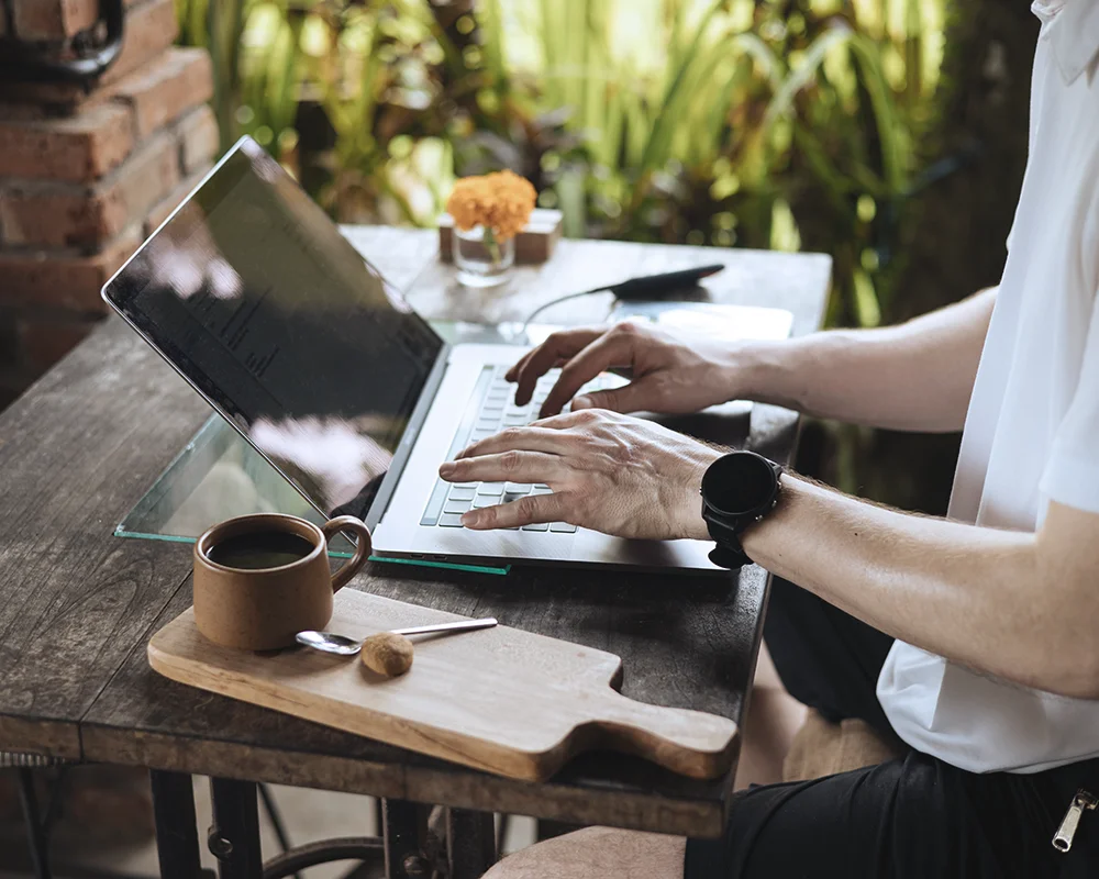 Professional working remotely on a laptop